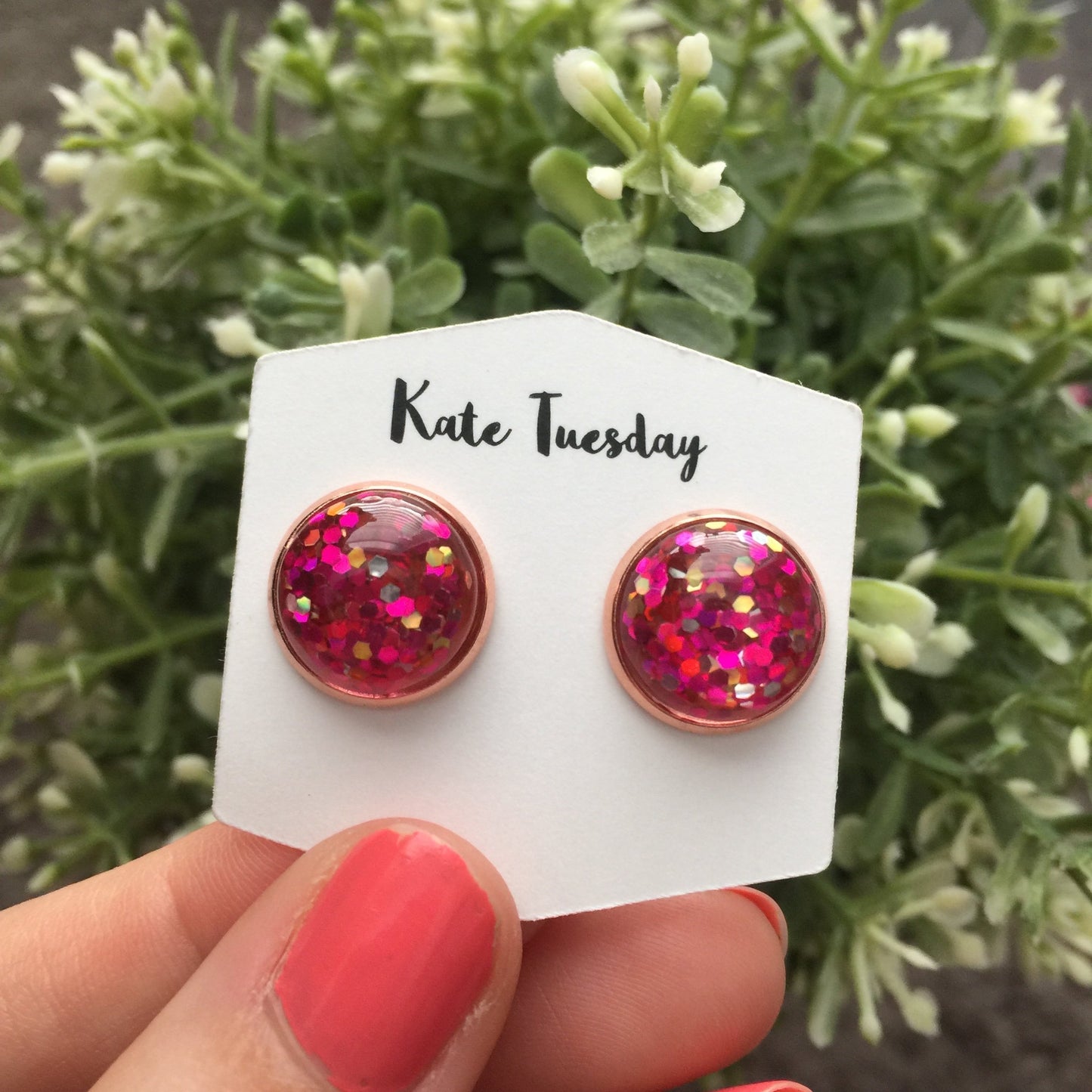 Pink glitter stud earrings in a rose gold setting, measuring 12mm in diameter