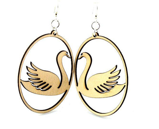 Elegant wooden swan earrings with wings, made from sustainably sourced wood, silver ear wires, measuring 2.1" x 1.4".