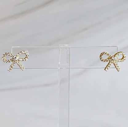 Shine Mini Bow Earrings in gold and crystal, crafted from sterling silver, perfect for elevating any outfit's style