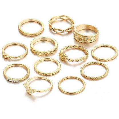 Set of 12 gold plated rings in different sizes, crafted from zinc alloy and gemstones. Sizes are fixed as shown in the image.