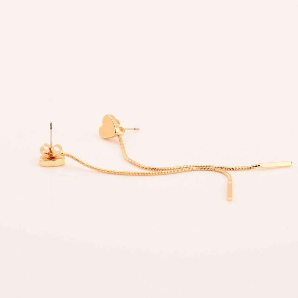 Gold heart-shaped drop earrings, measuring 8 cm, placed on a white surface. Made from alloy material.