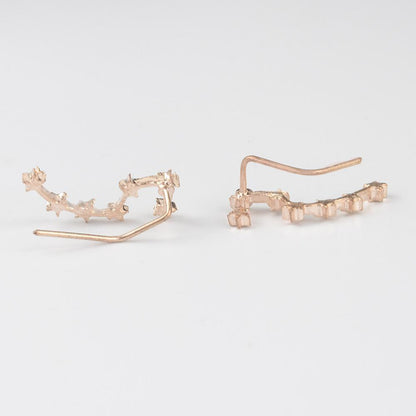 Elegant star constellation stud earrings crafted from durable zinc alloy, sold as a set of two.