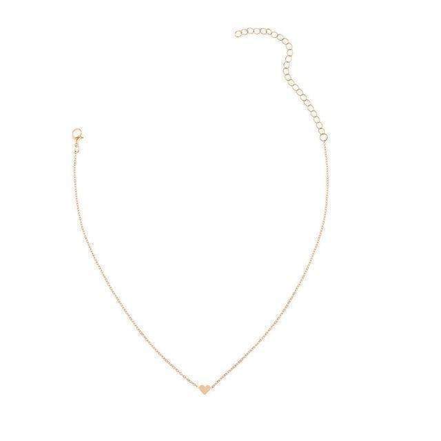  Gold necklace featuring a small heart charm, 14" length with a
4" extender, made of high-quality zinc alloy
