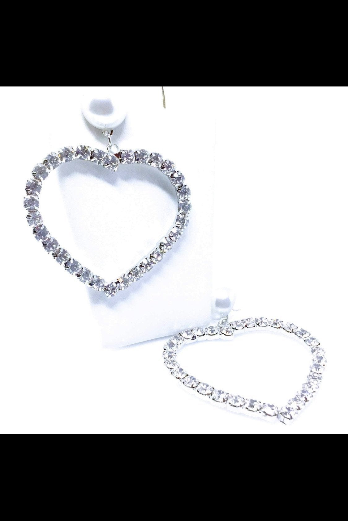 Stylish silver heart earrings with diamond accents, designed from high-quality zinc alloy, ideal for both casual and formal occasions.
