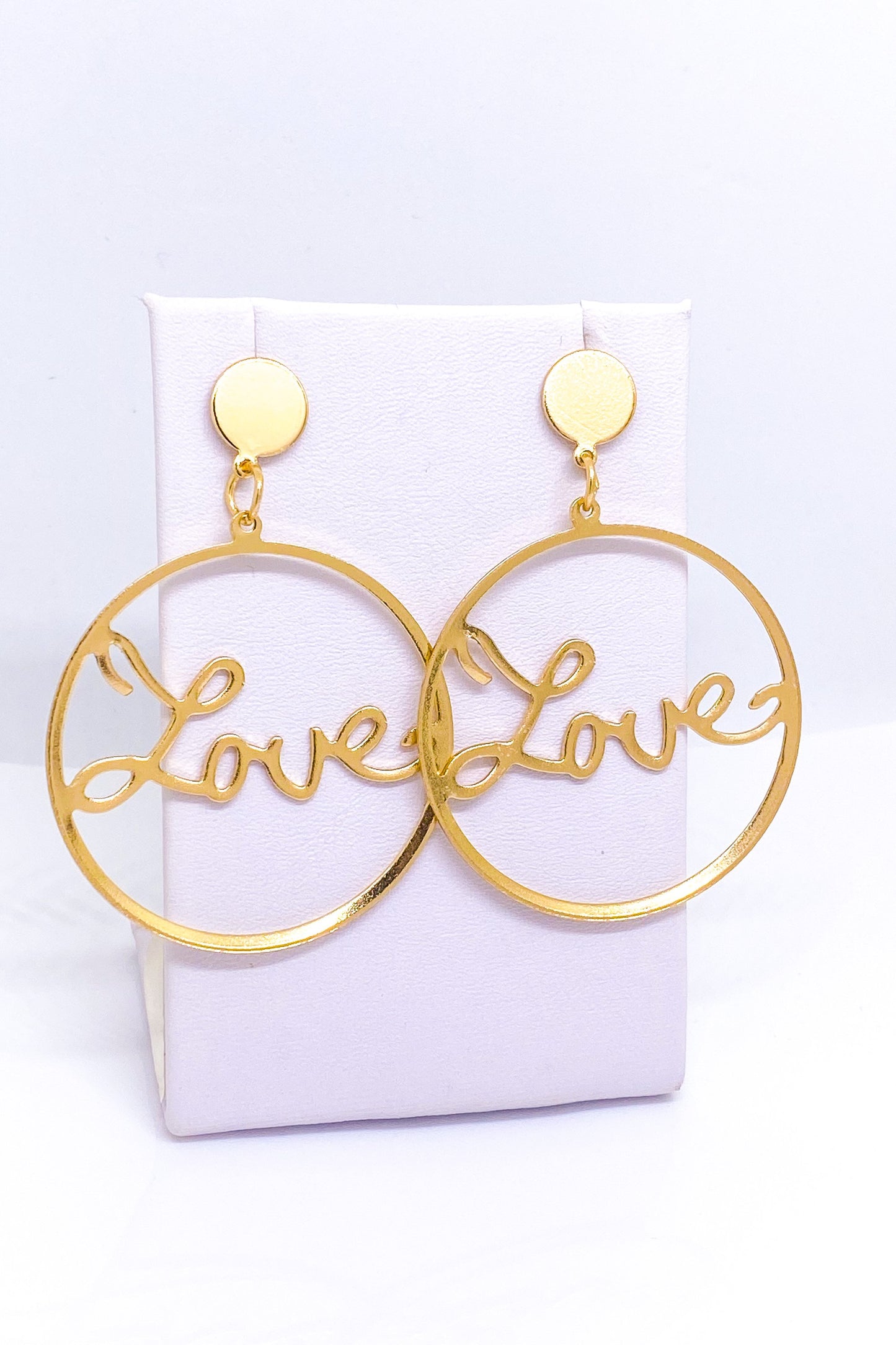 Gold dangle hoop earrings made of high-quality zinc alloy, perfect for special occasions and casual wear