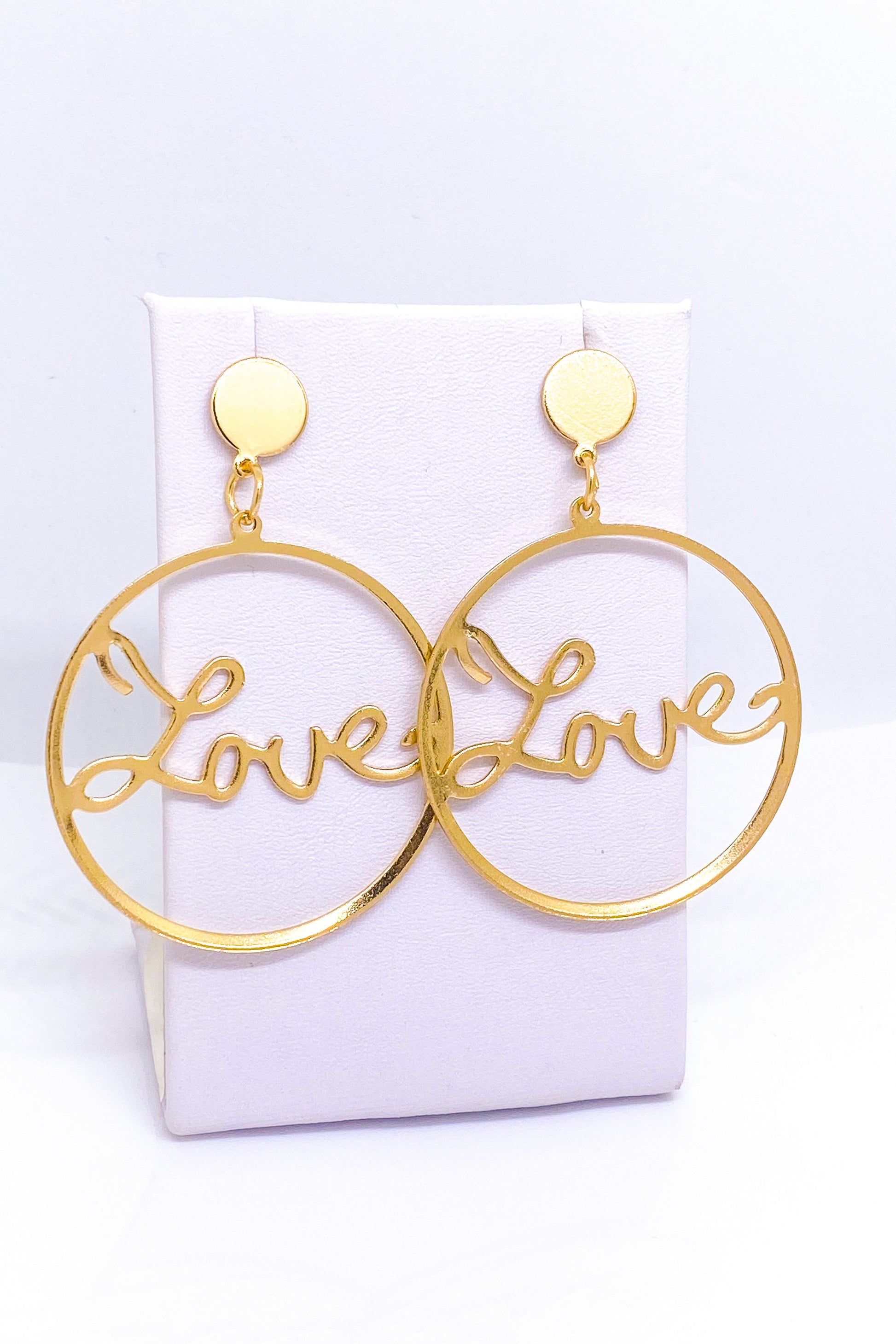 Gold dangle hoop earrings made of high-quality zinc alloy, perfect for special occasions and casual wear