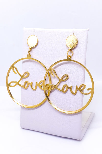 Stylish gold hoop earrings featuring a dangle design, ideal for events and everyday wear, made from high-quality materials.