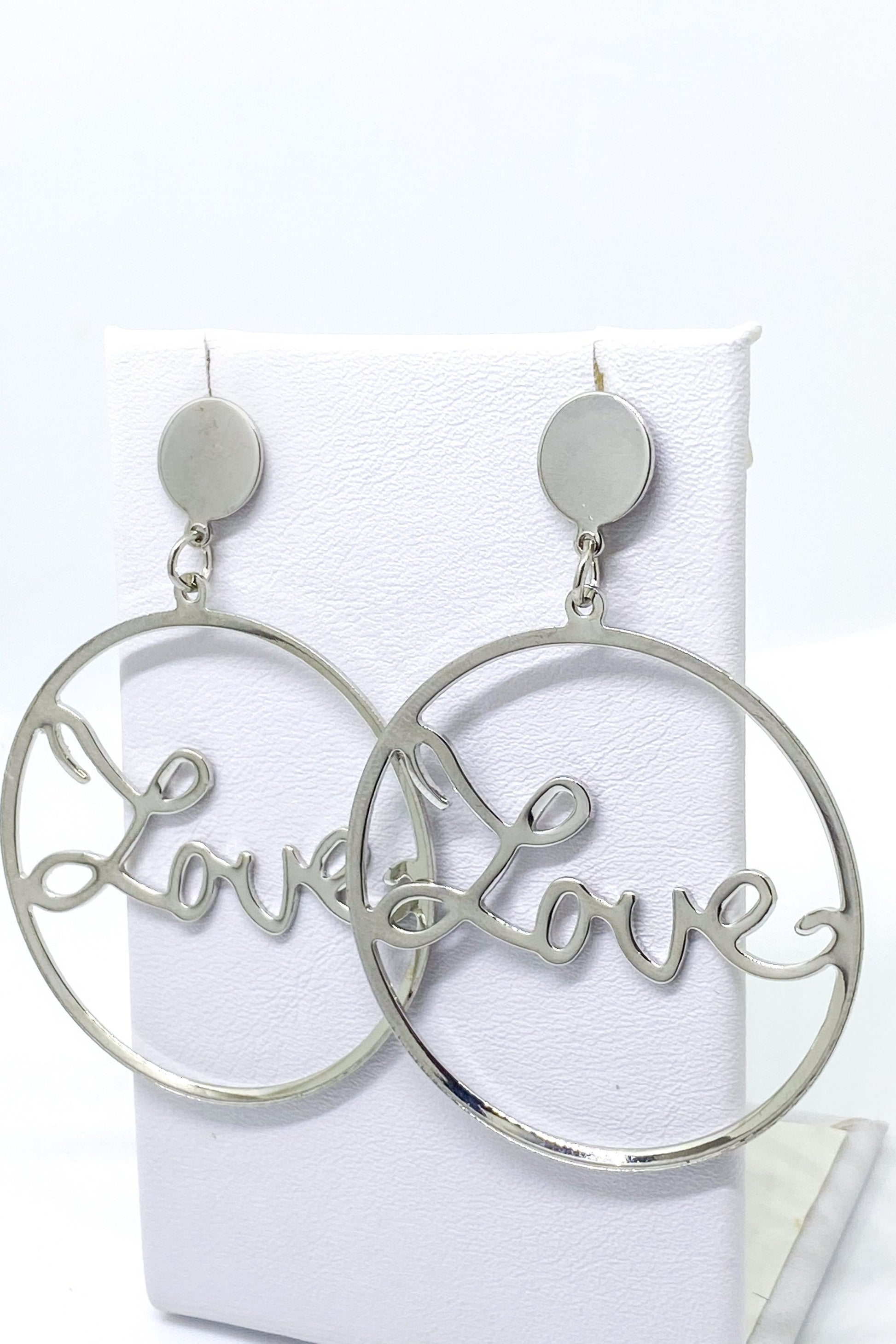 Silver dangle hoop earrings made of high-quality zinc alloy, perfect for special occasions and casual wear