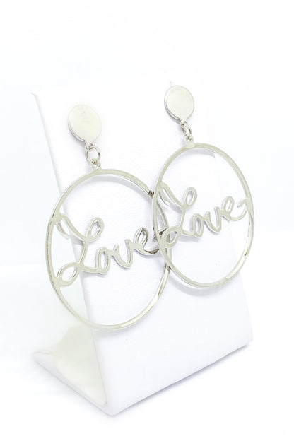 Stylish silver geometric hoop earrings crafted from durable zinc alloy, ideal for events and everyday fashion.