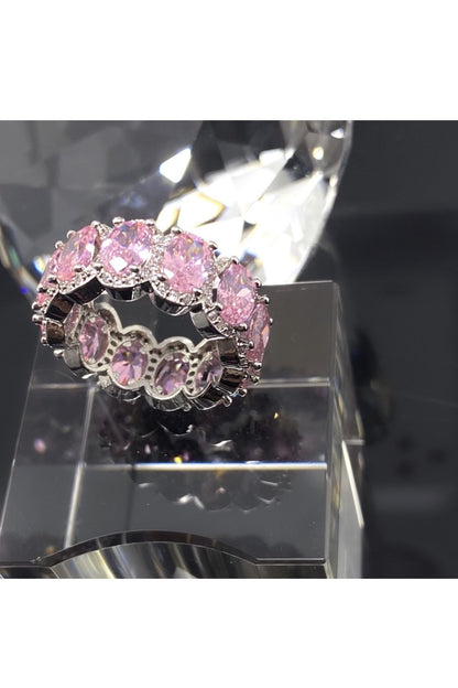 Elegant pink diamond eternity band crafted from polished 14K white gold, showcasing flawless VVS simulants.